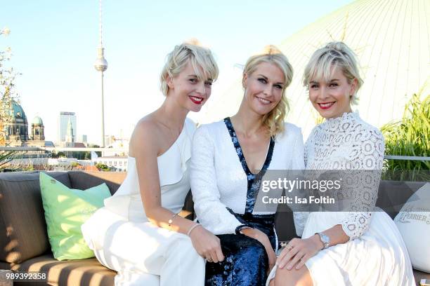 Advertising twins Julia Meise and Nina Meise with Natascha Gruen during the Ladies Dinner at Hotel De Rome on July 1, 2018 in Berlin, Germany.