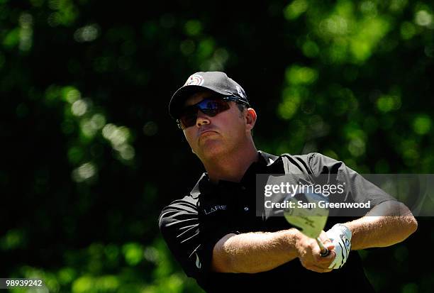 Bo Van Pelt plays his tee shot on the fifth hole during the final round of THE PLAYERS Championship held at THE PLAYERS Stadium course at TPC...