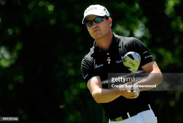 Zach Johnson plays his tee shot on the fifth hole during the final round of THE PLAYERS Championship held at THE PLAYERS Stadium course at TPC...