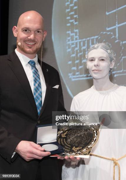 Astronaut Alexander Gerst receives the Urania medal in Berlin, Germany, 19 December 2017. According to the Urania, as an astronaut of the European...