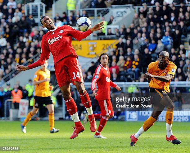 David Ngog of Liverpool goes up for a header during the Barclays Premier League match between Hull City and Liverpool at KC Stadium on May 9, 2010 in...