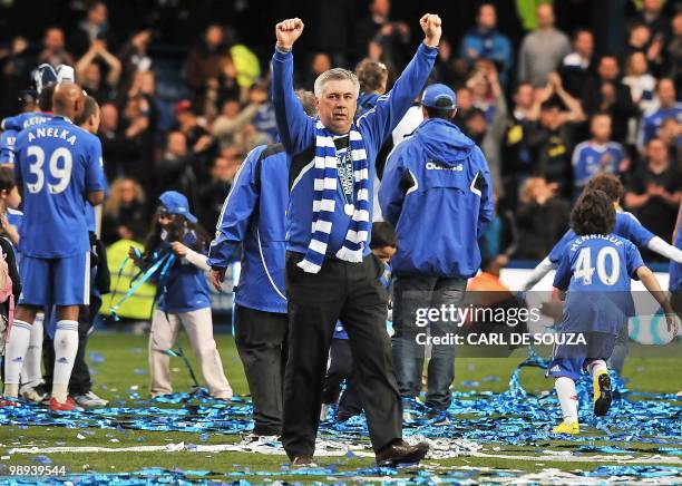 Chelsea's Italian manager Carlo Ancelotti celebrates after Chelsea win the title with a 8-0 victory over Wigan Athletic in the English Premier League...