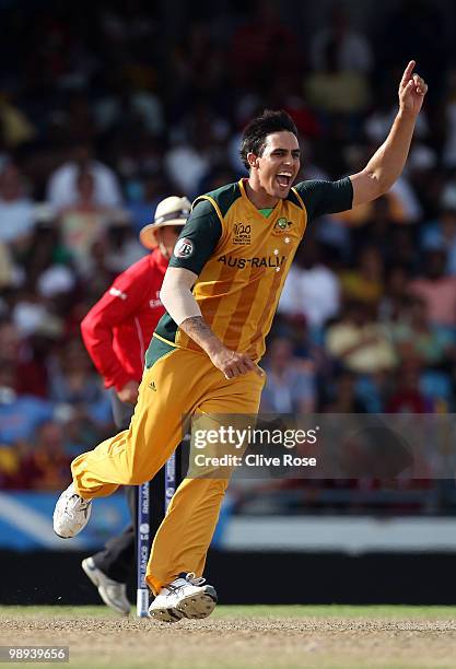 Mitchell Johnson of Australia celebrates the wicket of Tillakaratne Dilshan of Sri Lanka during the ICC World Twenty20 Super Eight match between Sri...