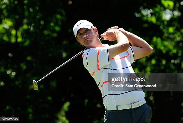 Lucas Glover plays his tee shot on the fifth hole during the final round of THE PLAYERS Championship held at THE PLAYERS Stadium course at TPC...