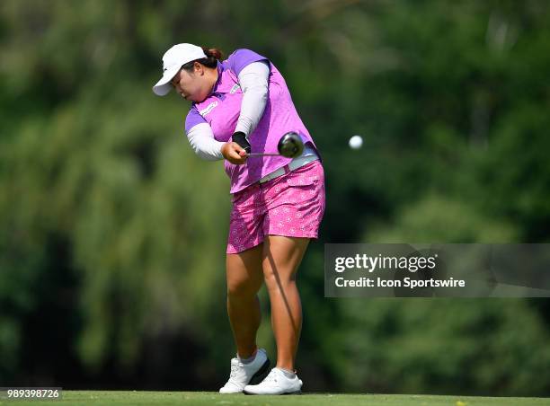 Shanshan Feng of China hits her tee shot on the seventh hole during the final round of the KPMG Women's PGA Championship on July 1, 2018 at the...