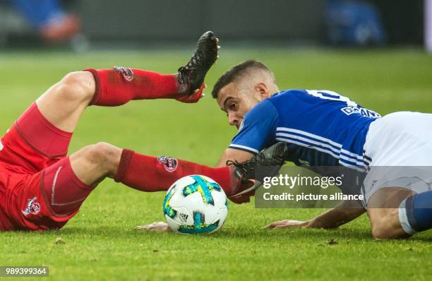 Schalke's Franco Di Santo in action against Cologne's Salih Ozcan during the German DFB Cup soccer match between FC Schalke 04 and 1. FC Cologne in...