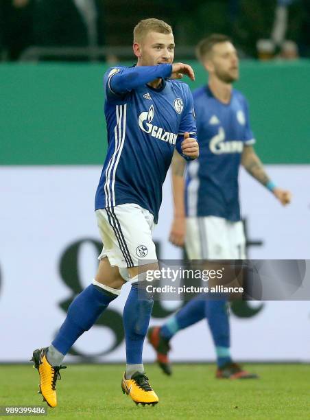 Schalke's Max Meyer celebrates his 1:0 goal during the German DFB Cup soccer match between FC Schalke 04 and 1. FC Cologne in the Veltins Arena in...