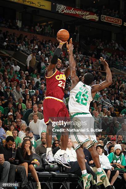 LeBron James of the Cleveland Cavaliers shoots against Tony Allen of the Boston Celtics in Game Four of the Eastern Conference Semifinals during the...