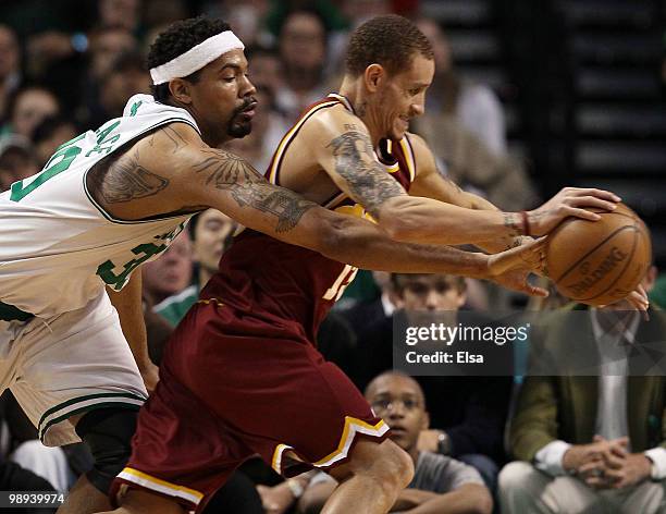 Delonte West of the Cleveland Cavaliers tries to keep the ball away from Rasheed Wallace of the Boston Celtics during Game Four of the Eastern...