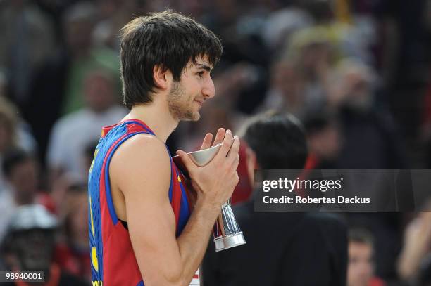 Ricky Rubio of Regal FC Barcelona holds a trophy during the 2009-2010 Euroleague Basketball Champion Awards Ceremony at Bercy Arena on May 9, 2010 in...