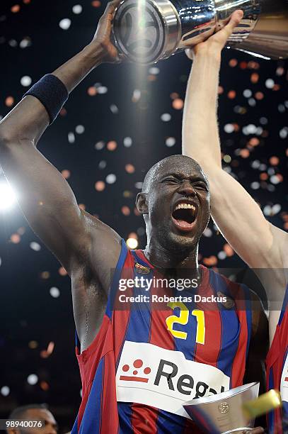 Boniface Ndong of Regal FC Barcelona celebrates with the trophy during the 2009-2010 Euroleague Basketball Champion Awards Ceremony at Bercy Arena on...