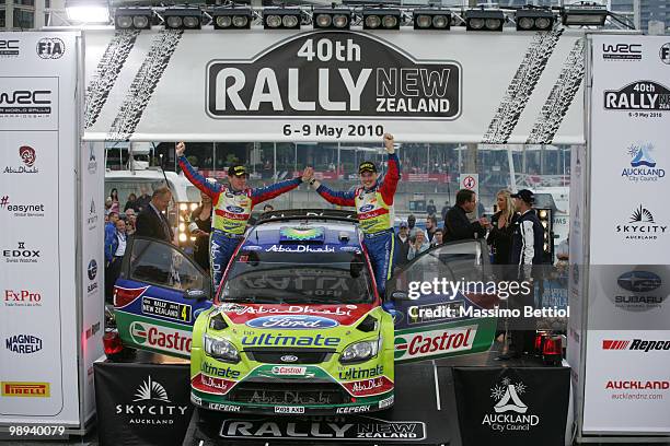 Jari Matti Latvala of Finland and co-driver Mikka Anttila of Finland celebrate their first position as a winner of the WRC Rally of New Zealand on...