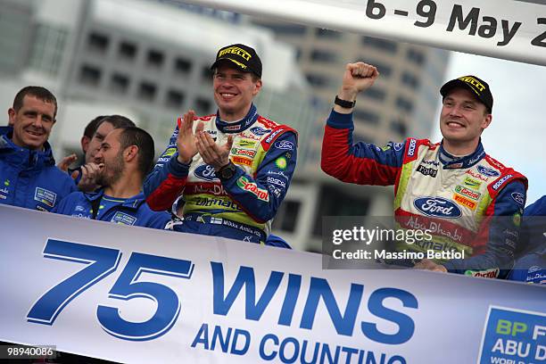 Jari Matti Latvala of Finland and co-driver Mikka Anttila of Finland celebrate their first position as a winner of the WRC Rally of New Zealand on...