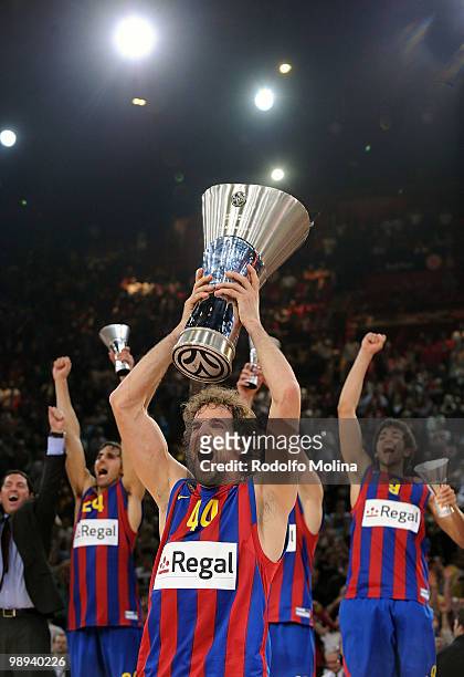 Roger Grimau and Regal FC Barcelona players celebrate with their trophies during the 2009-2010 Euroleague Basketball Champion Awards Ceremony at...