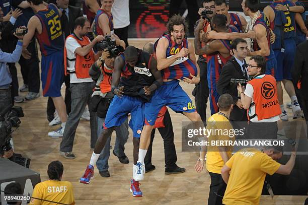 Regal Barcelona's Roger Grimau and Boniface Ndong celebrate after winning the Euroleague basketball final match Olympiacos Piraeus vs. Regal...