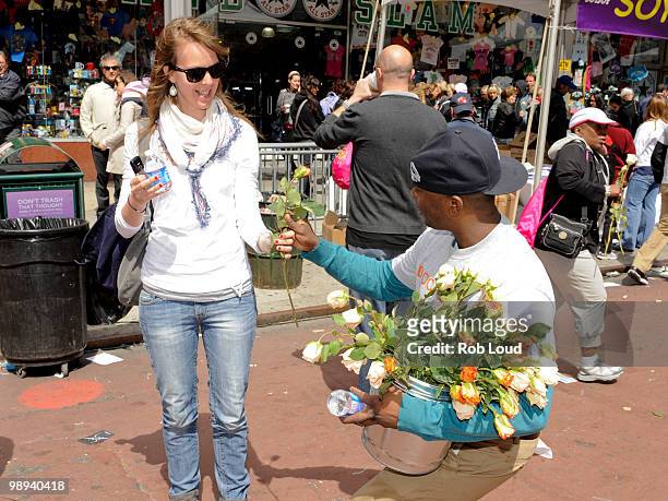Docker's crew members hand out flowers on Mother's Day during the ''DOCKERS 10,000 Acts of Chivalry'' in Manhattan on May 9, 2010 in New York City.