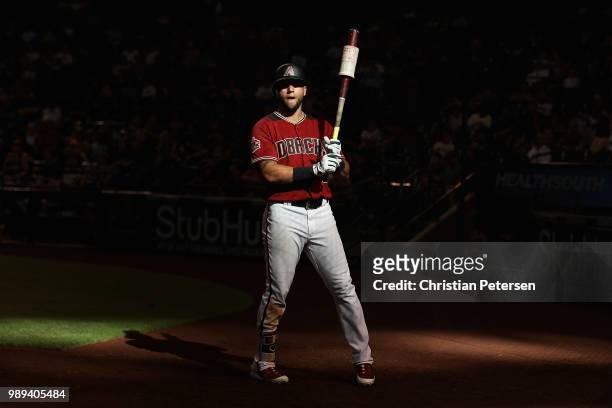 David Peralta of the Arizona Diamondbacks warms-up on deck during the ninth inning of the MLB game against the San Francisco Giants at Chase Field on...