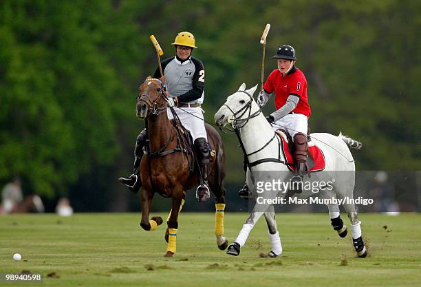 Prince Harry plays in the Audi Polo Challenge polo match at Coworth Polo Club on May 9, 2010 in Ascot, England.