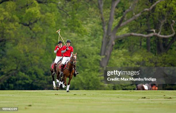 Prince William and HRH Prince Harry play in the Audi Polo Challenge polo match at Coworth Polo Club on May 9, 2010 in Ascot, England.