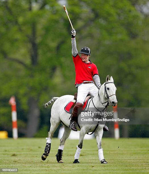 Prince Harry plays in the Audi Polo Challenge polo match at Coworth Polo Club on May 9, 2010 in Ascot, England.