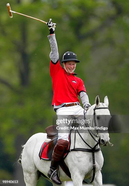 Prince Harry plays in the Audi Polo Challenge polo match at Coworth Polo Club on May 9, 2010 in Ascot, England.