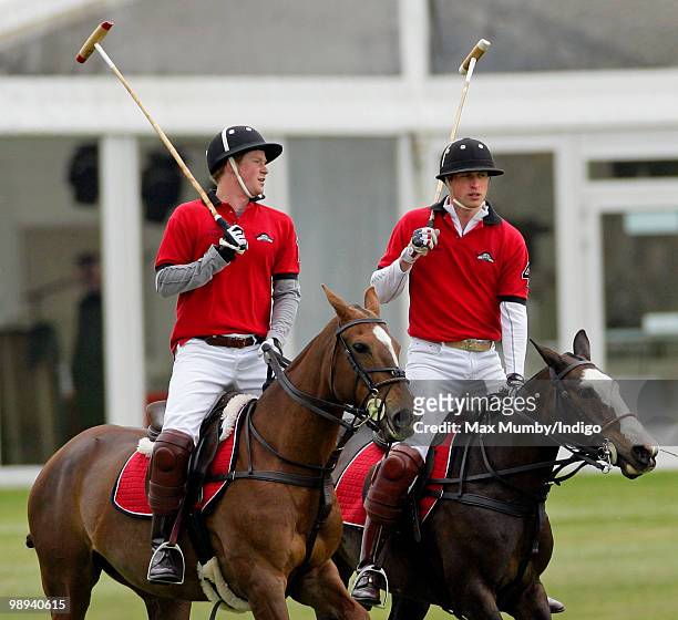 Prince Harry and HRH Prince William play in the Audi Polo Challenge polo match at Coworth Polo Club on May 9, 2010 in Ascot, England.