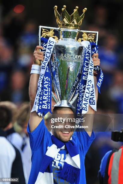 Joe Cole of Chelsea celebrates with the trophy as they win the title after the Barclays Premier League match between Chelsea and Wigan Athletic at...