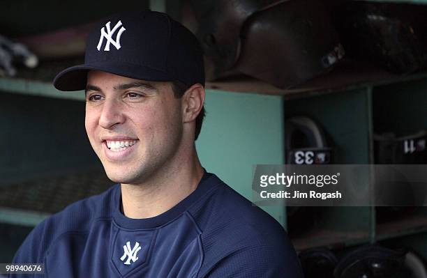 Mark Teixeira of the New York Yankees smiles while talking to reporters before a game against the Boston Red Sox at Fenway Park on May 9, 2010 in...