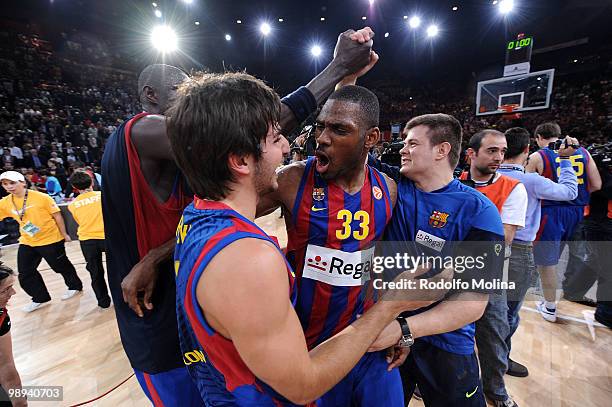 Ricky Rubio, #9 of Regal FC Barcelona and Pete Mickeal, #33 celebrates during the 2009-2010 Euroleague Basketball Champion Awards Ceremony at Bercy...