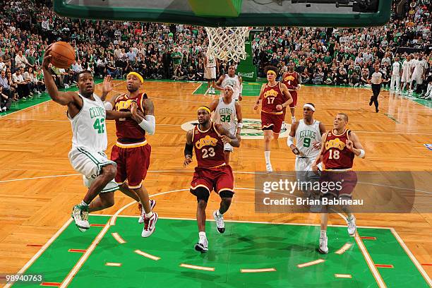 Tony Allen of the Boston Celtics lays the ball in the basket against Mo Williams of the Cleveland Cavaliers in Game Four of the Eastern Conference...