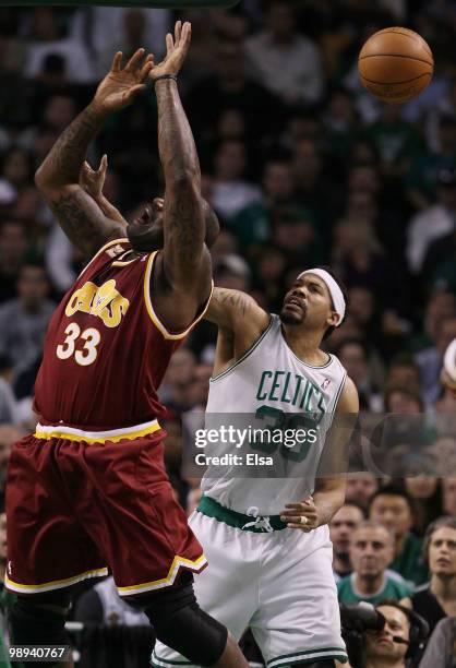 Shaquille O'Neal of the Cleveland Cavaliers is fouled by Rasheed Wallace of the Boston Celtics during Game Four of the Eastern Conference Semifinals...