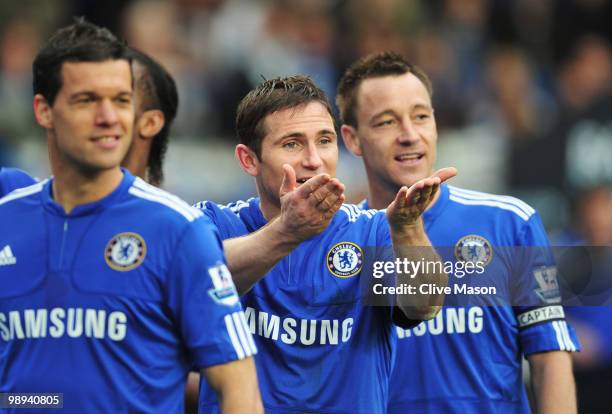 Frank Lampard of Chelsea blows a kiss as Michael Ballack and John Terry look on as they win the title after the Barclays Premier League match between...