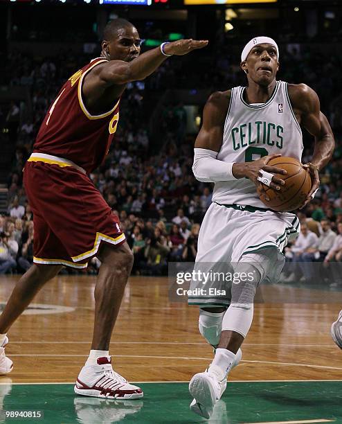 Rajon Rondo # of the Boston Celtics drives to the net as Antawn Jamison of the Cleveland Cavaliers defends during Game Four of the Eastern Conference...