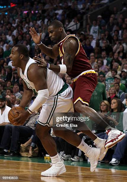 Glen Davis of the Boston Celtics grabs the ball as Antawn Jamison of the Cleveland Cavaliers defends during Game Four of the Eastern Conference...