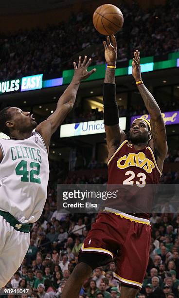 LeBron James of the Cleveland Cavaliers takes a shot as Tony Allen of the Boston Celtics defends during Game Four of the Eastern Conference...