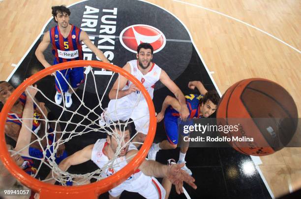 Theodoros Papaloukas, #4 of Olympiacos Piraeus in action during the Euroleague Basketball Final Four Final Game between Regal FC Barcelona vs...