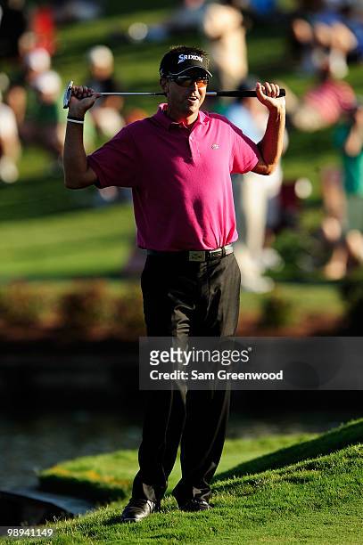 Robert Allenby of Australia reacts to his missed birdie putt on the 17th hole during the final round of THE PLAYERS Championship held at THE PLAYERS...