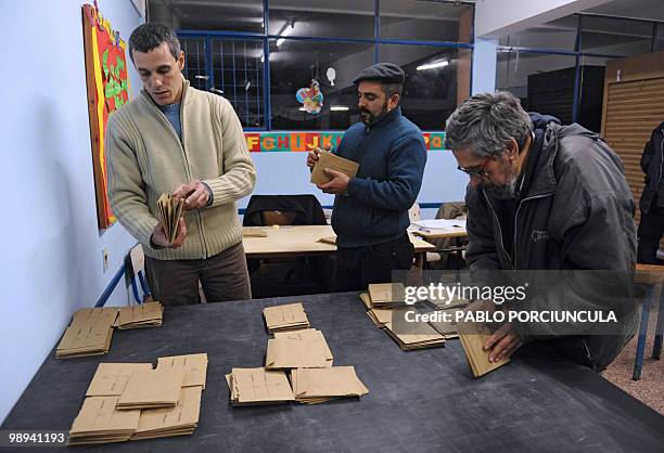 Ballots are counted at a polling station in la Floresta, Canelones, Uruguay on May 9 at the end of the municipal elections. AFP PHOTO / Pablo...