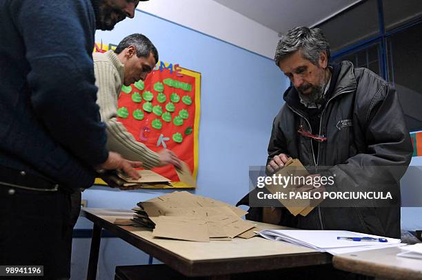 Ballots are counted at a polling station in la Floresta, Canelones, Uruguay on May 9 at the end of the municipal elections. AFP PHOTO / Pablo...