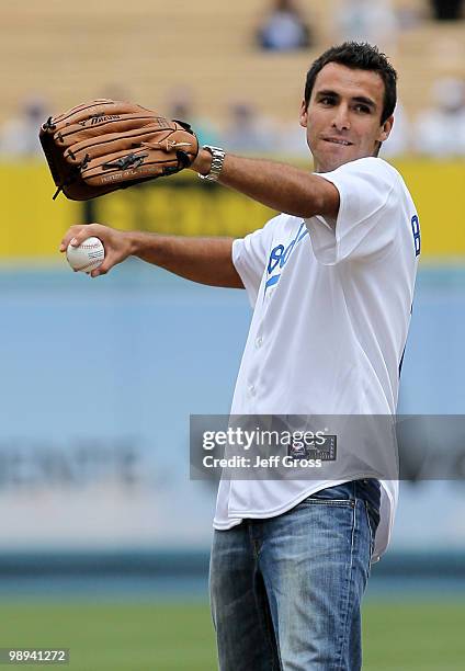 Jonathan Bornstein of MLS soccer team Chivas USA throws out the first pitch prior to the start of the game between the Los Angeles Dodgers and the...
