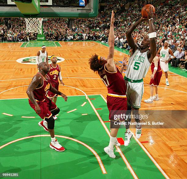 Kevin Garnett of the Boston Celtics shoots against Anderson Varejao of the Cleveland Cavaliers in Game Four of the Eastern Conference Semifinals...