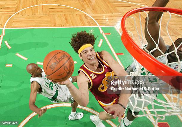 Anderson Varejao of the Cleveland Cavaliers shoots against Ray Allen and Kendrick Perkins of the Boston Celtics in Game Four of the Eastern...