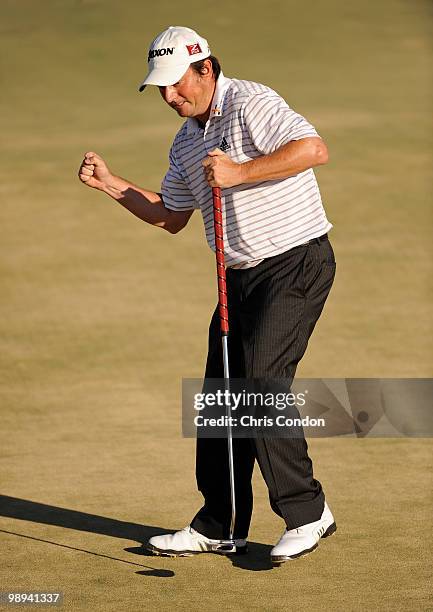 Tim Clark of South Africa reacts after saving par at the 18th hole during the final round of THE PLAYERS Championship on THE PLAYERS Stadium Course...