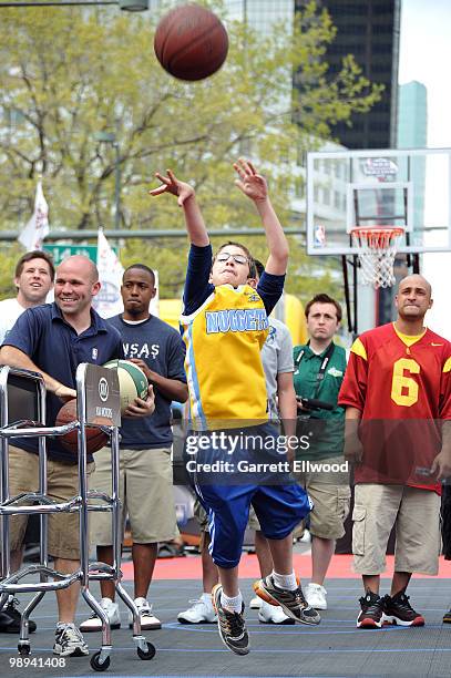 Fans take part in the NBA Nation Mobile Basketball Tour on May 9, 2010 at the "Cinco De Mayo Festival" in Denver, Colorado. NOTE TO USER: User...
