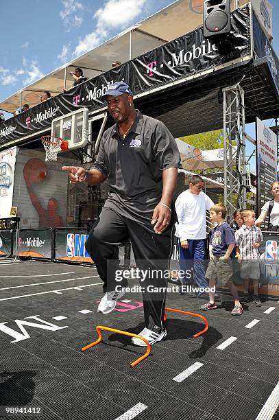 Legend Darryl Dawkins runs kids through an NBA Fit program during the NBA Nation Mobile Basketball Tour on May 9, 2010 at the "Cinco De Mayo...