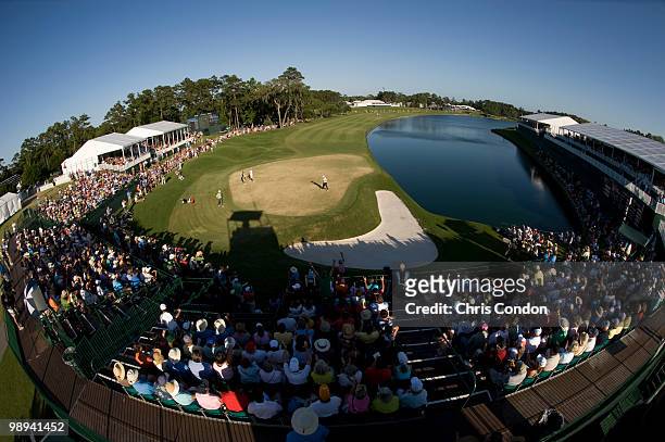 Tim Clark of South Africa saves par on the 18th hole during the final round of THE PLAYERS Championship on THE PLAYERS Stadium Course at TPC Sawgrass...