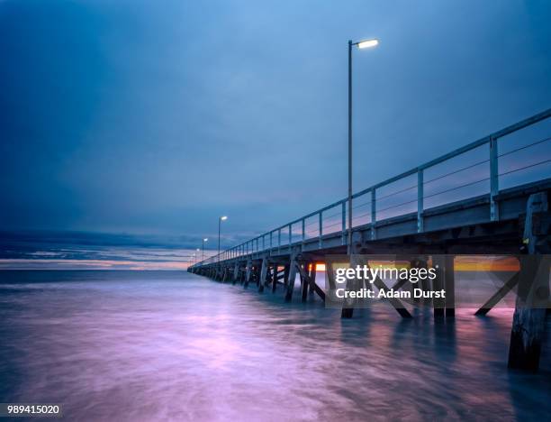 under the jetty - durst stock pictures, royalty-free photos & images