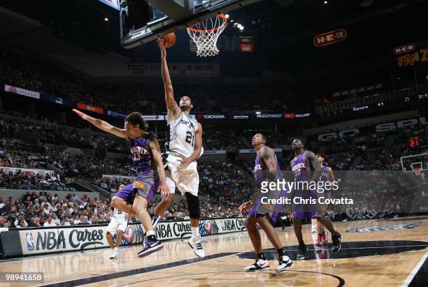 Tim Duncan of the San Antonio Spurs shoots over Steve Nash of the Phoenix Suns in Game Four of the Western Conference Semifinals during the 2010 NBA...