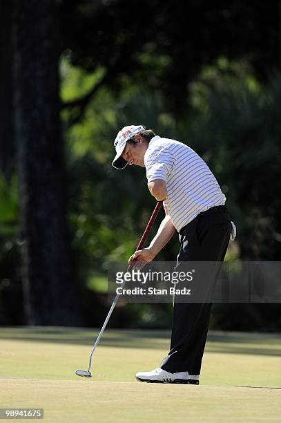 Tim Clark hits his putt at the 12th green during the final round of THE PLAYERS Championship on THE PLAYERS Stadium Course at TPC Sawgrass on May 9,...