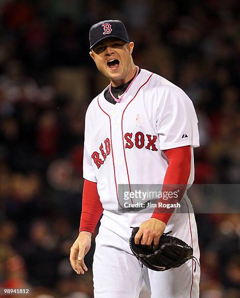 Jon Lester of the Boston Red Sox reacts in the fourth inning against the New York Yankees at Fenway Park on May 9, 2010 in Boston, Massachusetts.